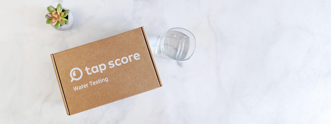 Tap score testing kit on marble table