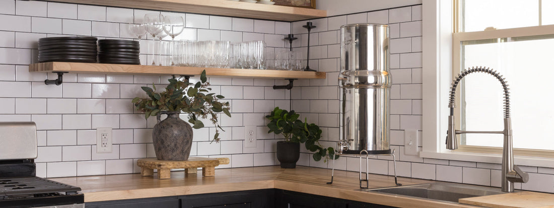 BOROUX legacy water filter system on a countertop next to sink and faucet