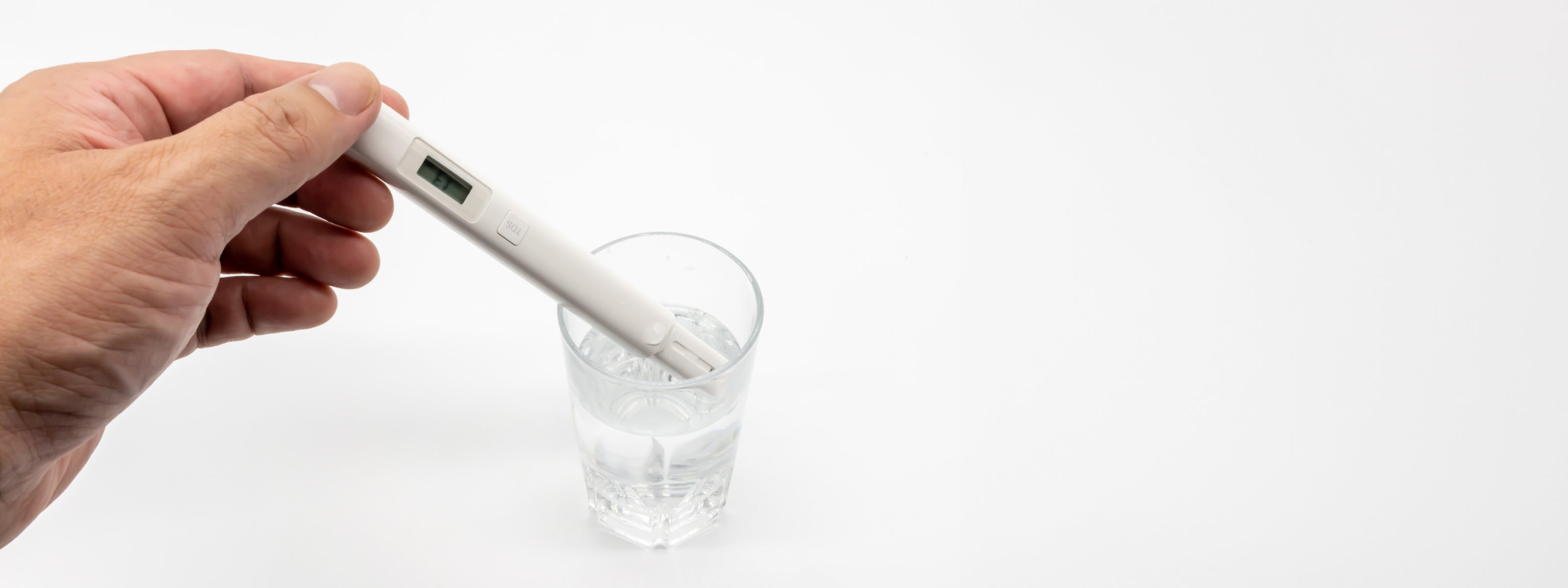 TDS meter testing water