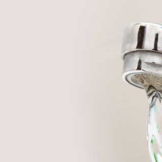 Tap water faucet close up