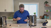 video of man installing parts of his boroux water filter system. 